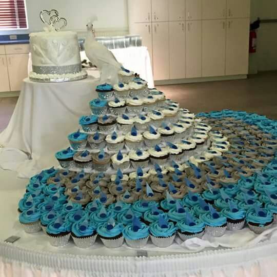 Cupcake cake wedding in the shape of a peacock